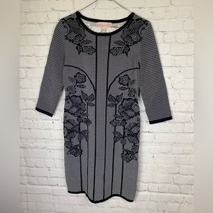 Philosophy dress in black and white with floral details. Size medium